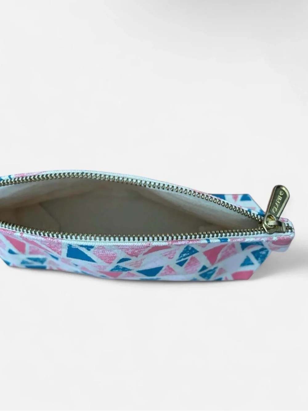 FEED10 Geometric Triangle Print Pouch in Pink & Teal